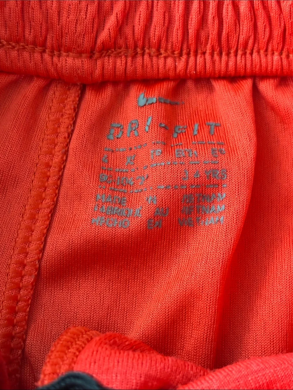 Nike Red Kids Athletic Shorts with Blue Logo and Side Panels size XS